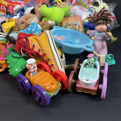 LOT 9: Vintage Happy Meal Toys Including Cabbage Patch Dolls, Ferby Elephant, Hot Wheels Toy Car (Both Still in Bag), Key Chains and Much...