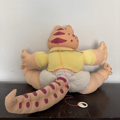 LOT 11: Adorable Cabbage Patch Doll with Adoption Papers and Baby Sinclair Talking Dinosaur (see pictures)