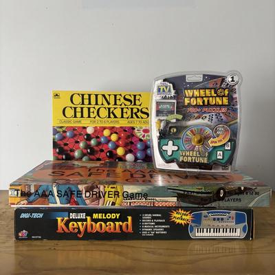 LOT 21: Vintage Triple AAA Safe Driver Board Game, Chinese Checkers (all Game Pieces Present), NIP Wheel of Fortune. NIP Melody Keyboard