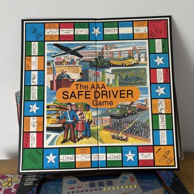 LOT 21: Vintage Triple AAA Safe Driver Board Game, Chinese Checkers (all Game Pieces Present), NIP Wheel of Fortune. NIP Melody Keyboard
