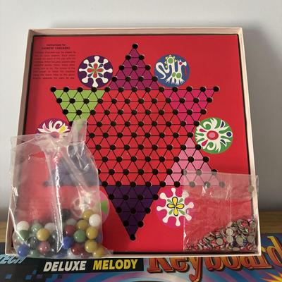 LOT 21: Vintage Triple AAA Safe Driver Board Game, Chinese Checkers (all Game Pieces Present), NIP Wheel of Fortune. NIP Melody Keyboard