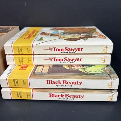 LOT 138: 1977 McDonalds Happy Meal Illustrated Classics Books Vol 1-4 The Wizard of Oz, Tom Sawyer, Black Beauty, A Christmas Carol &...