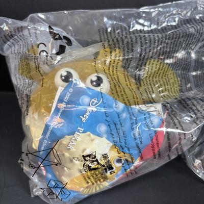 LOT 140: NIP McDonalds Happy Meal Toys: Finding Nemo (7), Barbies (14)