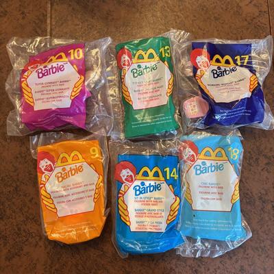 LOT 140: NIP McDonalds Happy Meal Toys: Finding Nemo (7), Barbies (14)