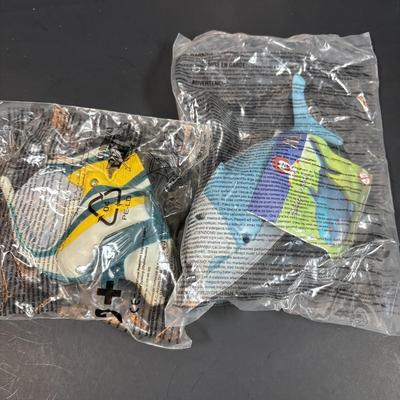 LOT 140: NIP McDonalds Happy Meal Toys: Finding Nemo (7), Barbies (14)