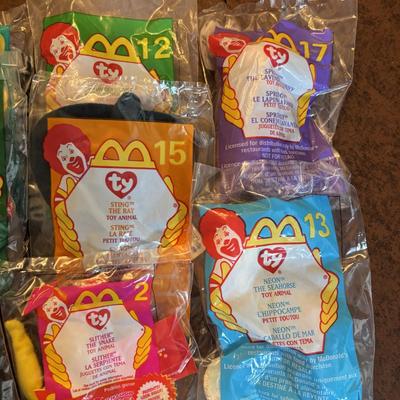LOT 140: NIP McDonalds Happy Meal Toys: Finding Nemo (7), Barbies (14)