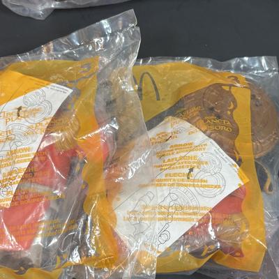 LOT 143: NIP McDonalds Happy Meal Toys: 3-D Spy Kids (6) Complete, Peter Pan, Treasure Planet & Atlantis