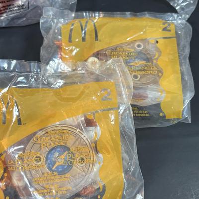LOT 143: NIP McDonalds Happy Meal Toys: 3-D Spy Kids (6) Complete, Peter Pan, Treasure Planet & Atlantis