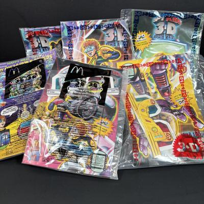 LOT 143: NIP McDonalds Happy Meal Toys: 3-D Spy Kids (6) Complete, Peter Pan, Treasure Planet & Atlantis