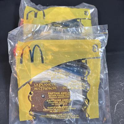 LOT 143: NIP McDonalds Happy Meal Toys: 3-D Spy Kids (6) Complete, Peter Pan, Treasure Planet & Atlantis