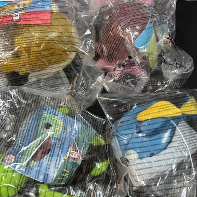 LOT 146: New in Package McDonalds Happy Meal Toys: Complete 2000 Barbies & 7 Finding Nemo