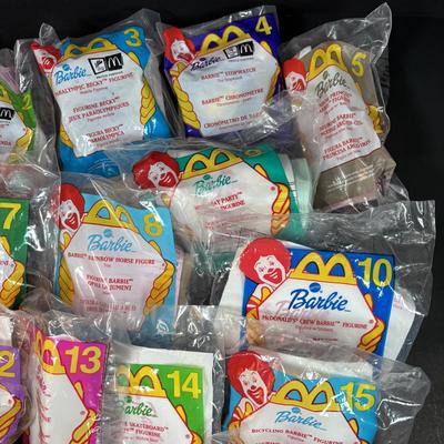 LOT 146: New in Package McDonalds Happy Meal Toys: Complete 2000 Barbies & 7 Finding Nemo