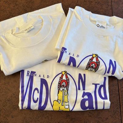 LOT 148: Vintage Ronald Mcdonald T-Shirts (qty of 3, XL), 3 Hats and a Plastic Coffee Mug w/Lid