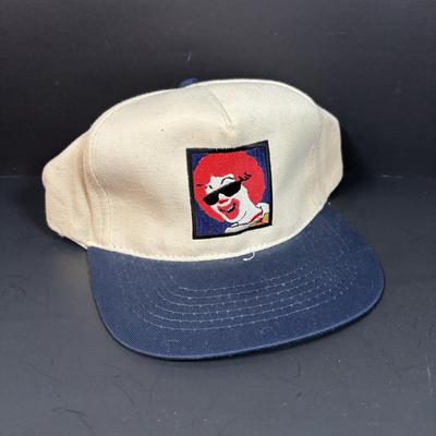 LOT 148: Vintage Ronald Mcdonald T-Shirts (qty of 3, XL), 3 Hats and a Plastic Coffee Mug w/Lid