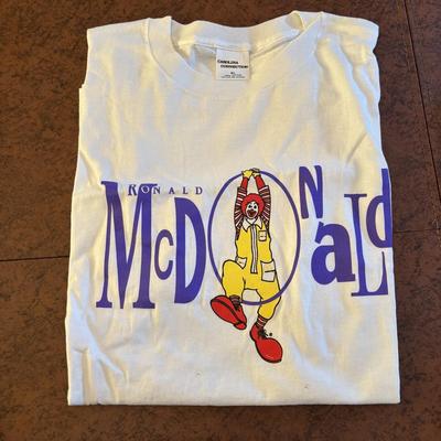 LOT 150: Vintage Ronald Mcdonald T-Shirt (qty 3, xl, xl, l), Hats (3) and a Lidded Plastic Coffee Mug