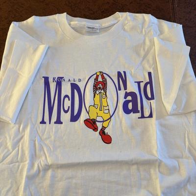 LOT 150: Vintage Ronald Mcdonald T-Shirt (qty 3, xl, xl, l), Hats (3) and a Lidded Plastic Coffee Mug