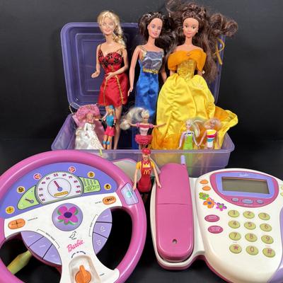 LOT 151: Barbie Collection: Vintage 2000 Mattel Barbie Drive with Me Steering Wheel, 2002 Mattel Barbie Calling Phone, Barbies and More