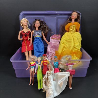 LOT 151: Barbie Collection: Vintage 2000 Mattel Barbie Drive with Me Steering Wheel, 2002 Mattel Barbie Calling Phone, Barbies and More