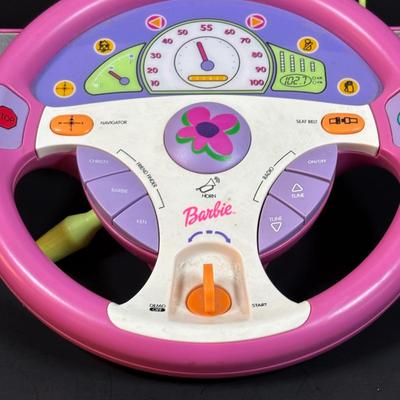LOT 151: Barbie Collection: Vintage 2000 Mattel Barbie Drive with Me Steering Wheel, 2002 Mattel Barbie Calling Phone, Barbies and More