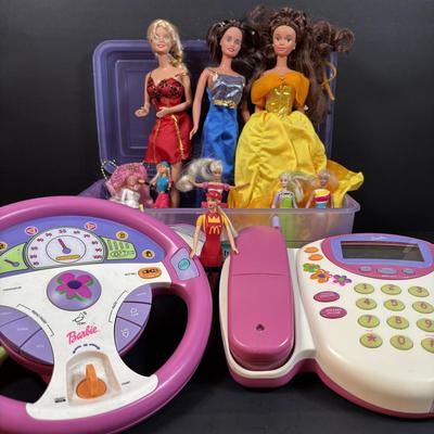 LOT 151: Barbie Collection: Vintage 2000 Mattel Barbie Drive with Me Steering Wheel, 2002 Mattel Barbie Calling Phone, Barbies and More