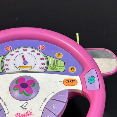 LOT 151: Barbie Collection: Vintage 2000 Mattel Barbie Drive with Me Steering Wheel, 2002 Mattel Barbie Calling Phone, Barbies and More