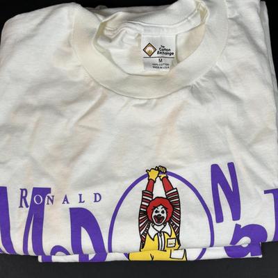 LOT 152: Vintage Ronald McDonald T-Shirts (qty 3, M, L, XL), Mc Donalds Hat and a Thermo Whirly Cup