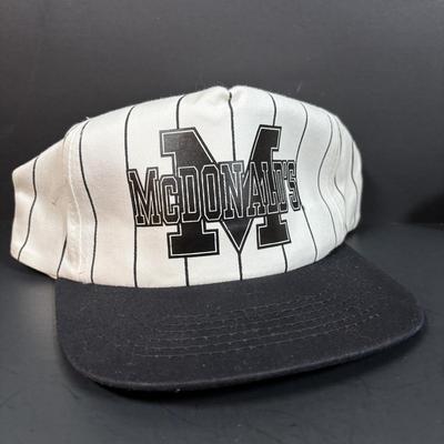 LOT 152: Vintage Ronald McDonald T-Shirts (qty 3, M, L, XL), Mc Donalds Hat and a Thermo Whirly Cup