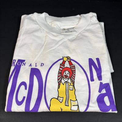 LOT 152: Vintage Ronald McDonald T-Shirts (qty 3, M, L, XL), Mc Donalds Hat and a Thermo Whirly Cup