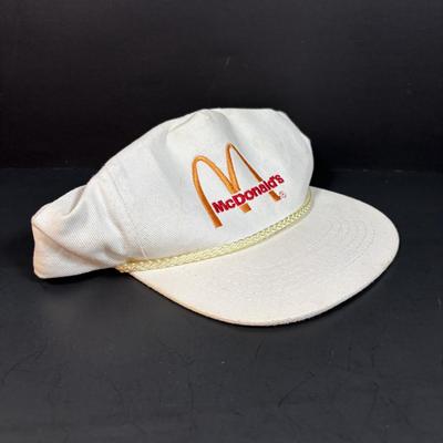 LOT 152: Vintage Ronald McDonald T-Shirts (qty 3, M, L, XL), Mc Donalds Hat and a Thermo Whirly Cup