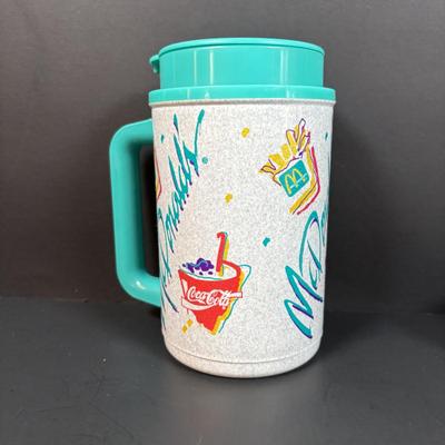 LOT 152: Vintage Ronald McDonald T-Shirts (qty 3, M, L, XL), Mc Donalds Hat and a Thermo Whirly Cup