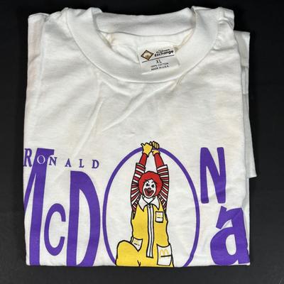 LOT 152: Vintage Ronald McDonald T-Shirts (qty 3, M, L, XL), Mc Donalds Hat and a Thermo Whirly Cup