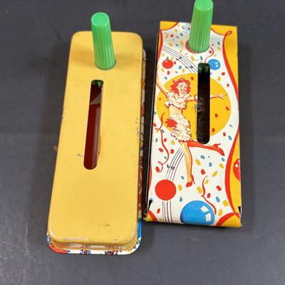 LOT 158: Vintage US Metal Toy Mg. Co, Noise Makers (qty 4), View Master Reels, Clown Toy & More