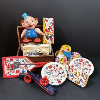 LOT 158: Vintage US Metal Toy Mg. Co, Noise Makers (qty 4), View Master Reels, Clown Toy & More