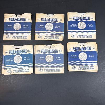 LOT 158: Vintage US Metal Toy Mg. Co, Noise Makers (qty 4), View Master Reels, Clown Toy & More