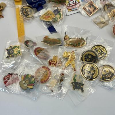 LOT 334: McDonalds Collection: Ronald McDonald & Grimace Digital Watches, NIP Lapel Pins & More
