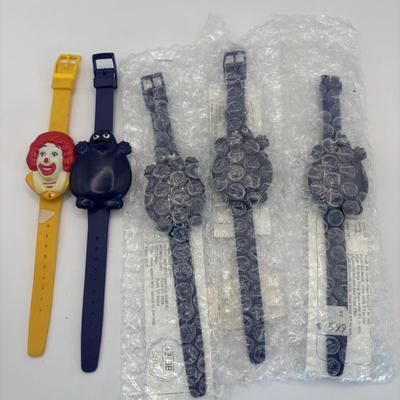 LOT 334: McDonalds Collection: Ronald McDonald & Grimace Digital Watches, NIP Lapel Pins & More