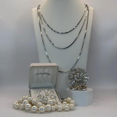 LOT 340 Silver Tone Multi Strand Necklace, Double Strand of Fauz Pearls, Rhinestone Brooch & Clip Earrings & Social Gallery...