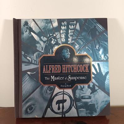 LOT 66L: Alexander Calder: Meet the Artist Interactive Book, M.C. Escher and Alfred Hitchcock Pop-Up Books, Banksy in New York & More