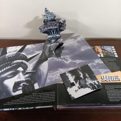 LOT 66L: Alexander Calder: Meet the Artist Interactive Book, M.C. Escher and Alfred Hitchcock Pop-Up Books, Banksy in New York & More