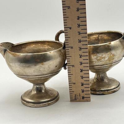 LOT 130K: Weighted Base Sterling Silver Creamer and Sugar Bowl + Sterling Handle Carving Set