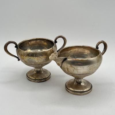 LOT 130K: Weighted Base Sterling Silver Creamer and Sugar Bowl + Sterling Handle Carving Set