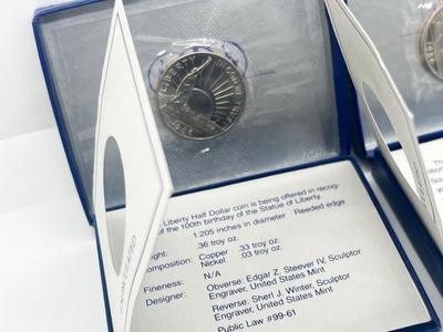 LOT 174J: Two 1986 US Liberty Uncirculated Half Dollars