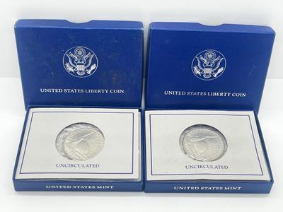 LOT 174J: Two 1986 US Liberty Uncirculated Half Dollars