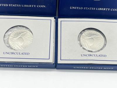 LOT 174J: Two 1986 US Liberty Uncirculated Half Dollars