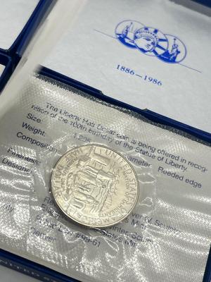 LOT 174J: Two 1986 US Liberty Uncirculated Half Dollars