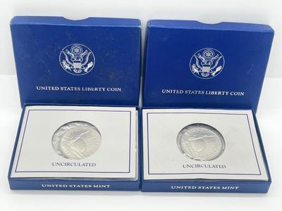 LOT 174J: Two 1986 US Liberty Uncirculated Half Dollars