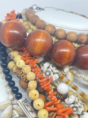 LOT 213J: Unique Beaded Necklace Collection Including Bone and Wood Beads