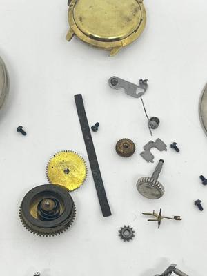 LOT 219J: Various Watch Parts and Pieces