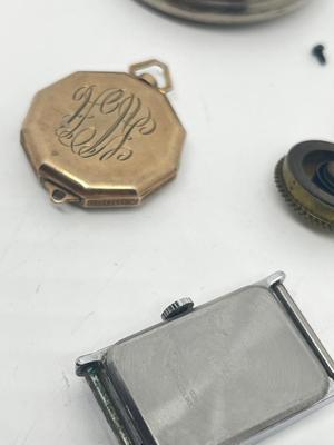 LOT 219J: Various Watch Parts and Pieces