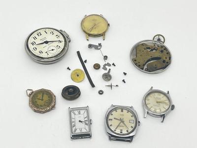 LOT 219J: Various Watch Parts and Pieces